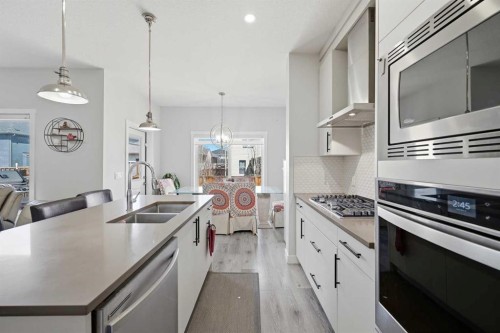 82 Legacy Glen Terrace Se, Calgary, AB - Indoor Photo Showing Kitchen With Double Sink With Upgraded Kitchen