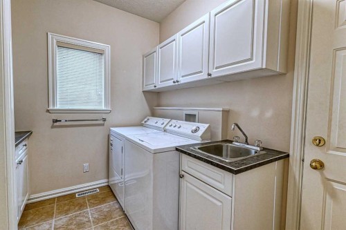 253 Patterson Boulevard Sw, Calgary, AB - Indoor Photo Showing Laundry Room