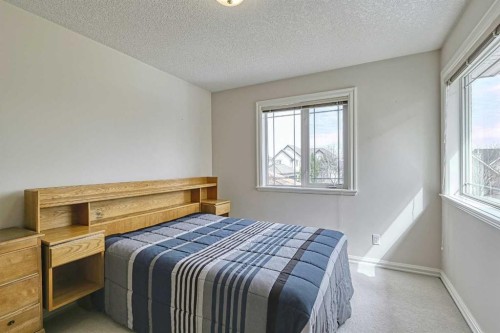 253 Patterson Boulevard Sw, Calgary, AB - Indoor Photo Showing Bedroom