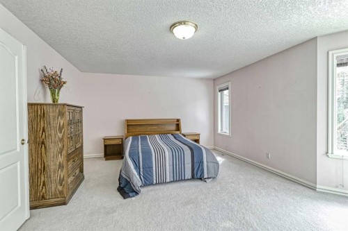 253 Patterson Boulevard Sw, Calgary, AB - Indoor Photo Showing Bedroom