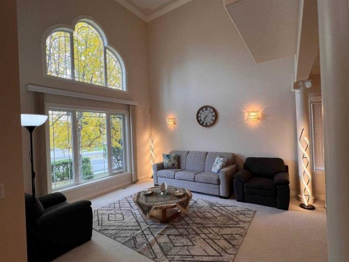 253 Patterson Boulevard Sw, Calgary, AB - Indoor Photo Showing Living Room