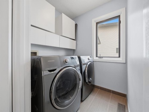 247 Hidden Valley Place Nw, Calgary, AB - Indoor Photo Showing Laundry Room