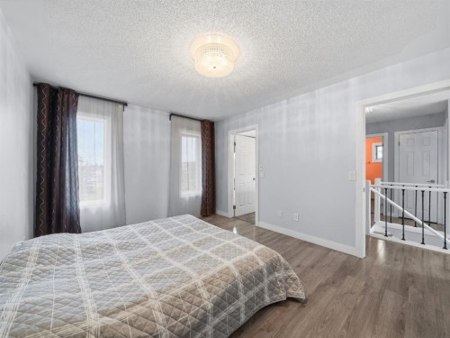 247 Hidden Valley Place Nw, Calgary, AB - Indoor Photo Showing Bedroom