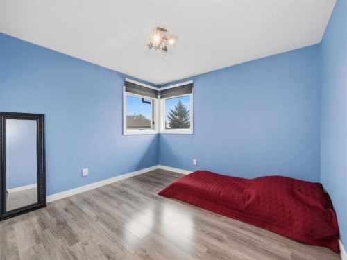 247 Hidden Valley Place Nw, Calgary, AB - Indoor Photo Showing Bedroom