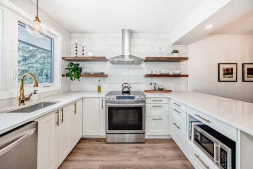 60 Point Drive Nw, Calgary, AB - Indoor Photo Showing Kitchen With Upgraded Kitchen