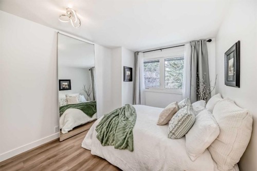 60 Point Drive Nw, Calgary, AB - Indoor Photo Showing Bedroom