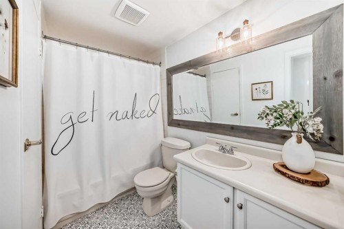 60 Point Drive Nw, Calgary, AB - Indoor Photo Showing Bathroom