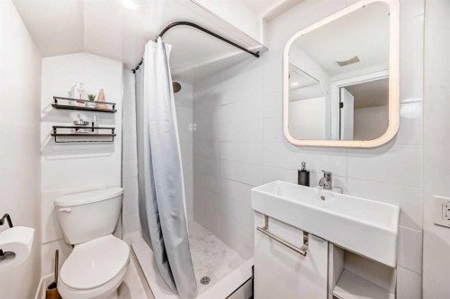 60 Point Drive Nw, Calgary, AB - Indoor Photo Showing Bathroom