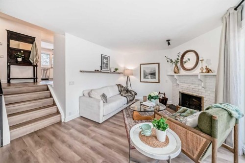 60 Point Drive Nw, Calgary, AB - Indoor With Fireplace