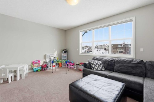 99 Sunset View, Cochrane, AB - Indoor Photo Showing Living Room