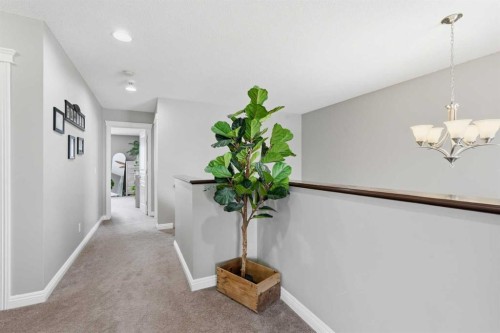 99 Sunset View, Cochrane, AB - Indoor Photo Showing Other Room