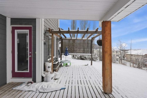 99 Sunset View, Cochrane, AB - Outdoor With Deck Patio Veranda With Exterior