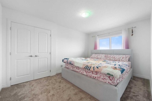 99 Evansglen Circle Nw, Calgary, AB - Indoor Photo Showing Bedroom