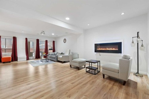 99 Evansglen Circle Nw, Calgary, AB - Indoor Photo Showing Living Room With Fireplace