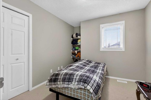 135 Copperstone Grove Se, Calgary, AB - Indoor Photo Showing Bedroom