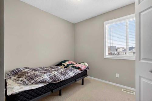135 Copperstone Grove Se, Calgary, AB - Indoor Photo Showing Bedroom
