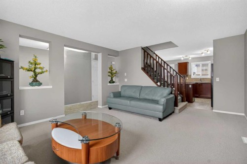 135 Copperstone Grove Se, Calgary, AB - Indoor Photo Showing Living Room