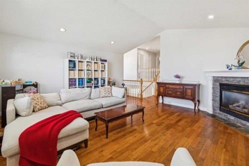 450 Wentworth Place Sw, Calgary, AB - Indoor Photo Showing Living Room With Fireplace