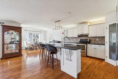450 Wentworth Place Sw, Calgary, AB - Indoor Photo Showing Kitchen With Stainless Steel Kitchen