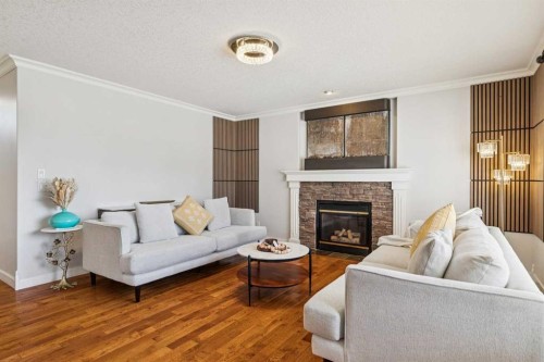 450 Wentworth Place Sw, Calgary, AB - Indoor Photo Showing Living Room With Fireplace