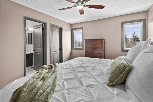48 Rivergreen Crescent Se, Calgary, AB - Indoor Photo Showing Bedroom