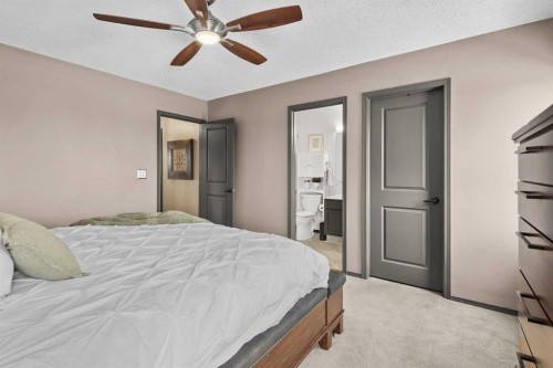 48 Rivergreen Crescent Se, Calgary, AB - Indoor Photo Showing Bedroom