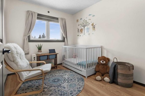 48 Rivergreen Crescent Se, Calgary, AB - Indoor Photo Showing Bedroom