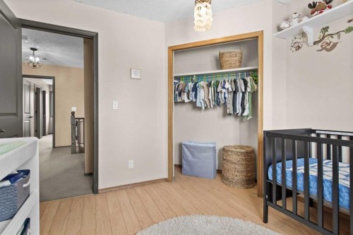 48 Rivergreen Crescent Se, Calgary, AB - Indoor Photo Showing Bedroom