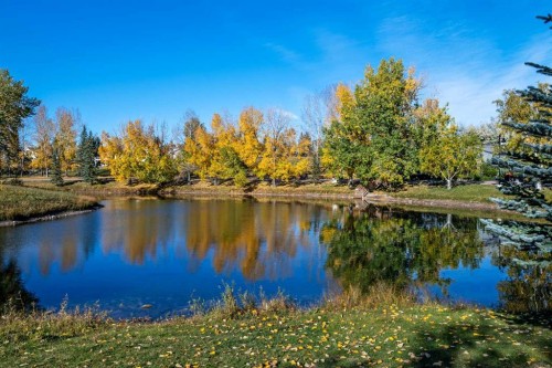 48 Rivergreen Crescent Se, Calgary, AB - Outdoor With Body Of Water With View