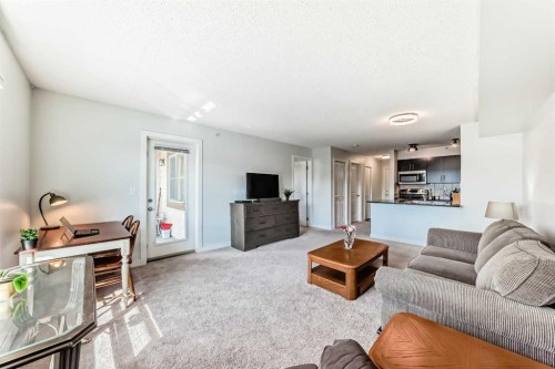 2411-81 Legacy Boulevard Se, Calgary, AB - Indoor Photo Showing Living Room