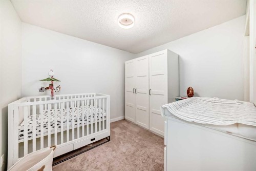 2411-81 Legacy Boulevard Se, Calgary, AB - Indoor Photo Showing Bedroom