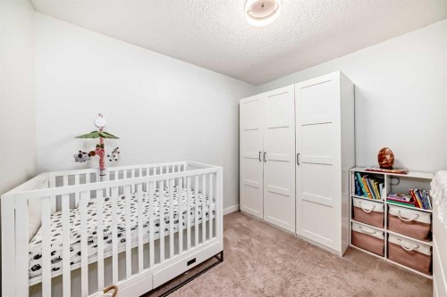 2411-81 Legacy Boulevard Se, Calgary, AB - Indoor Photo Showing Bedroom