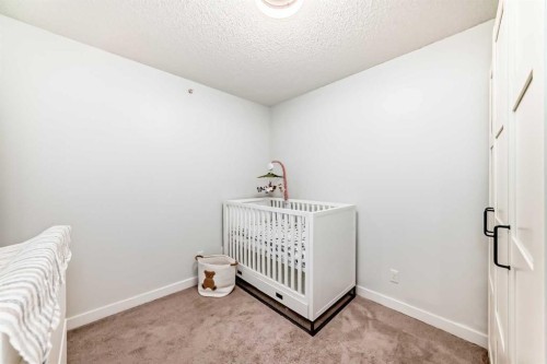 2411-81 Legacy Boulevard Se, Calgary, AB - Indoor Photo Showing Bedroom
