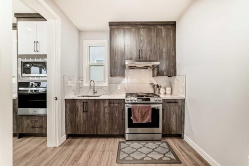 82 Waterford Crescent, Chestermere, AB - Indoor Photo Showing Kitchen With Upgraded Kitchen