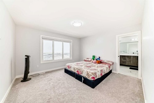 82 Waterford Crescent, Chestermere, AB - Indoor Photo Showing Bedroom