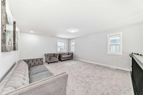 82 Waterford Crescent, Chestermere, AB - Indoor Photo Showing Living Room