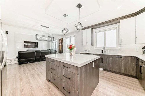 82 Waterford Crescent, Chestermere, AB - Indoor Photo Showing Kitchen With Upgraded Kitchen