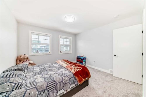 82 Waterford Crescent, Chestermere, AB - Indoor Photo Showing Bedroom