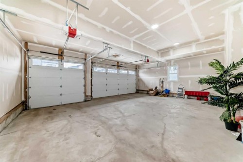 82 Waterford Crescent, Chestermere, AB - Indoor Photo Showing Garage