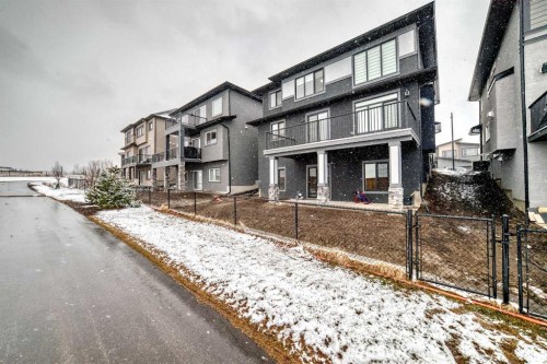 82 Waterford Crescent, Chestermere, AB - Outdoor With Balcony With Facade