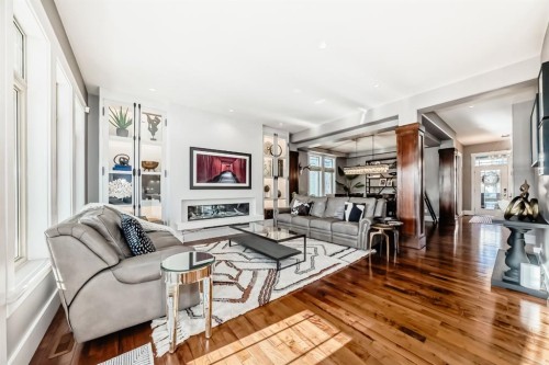 22 Angle Street Sw, Calgary, AB - Indoor Photo Showing Living Room With Fireplace