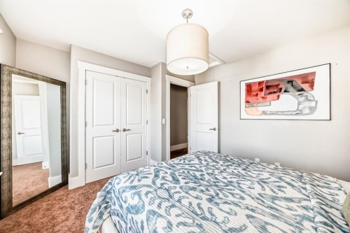 22 Angle Street Sw, Calgary, AB - Indoor Photo Showing Bedroom