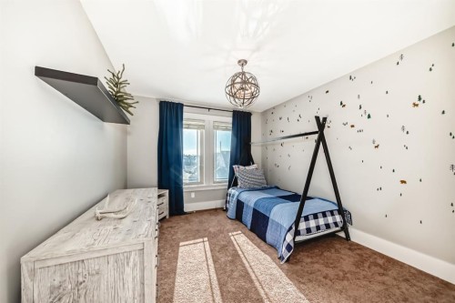 22 Angle Street Sw, Calgary, AB - Indoor Photo Showing Bedroom