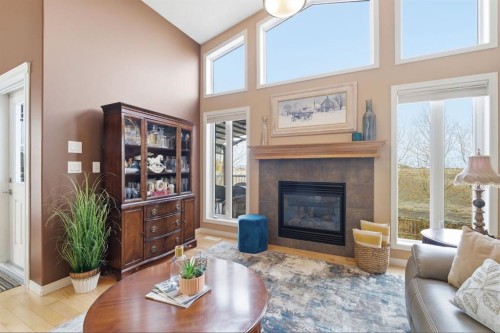 10 Goddard Circle, Carstairs, AB - Indoor Photo Showing Living Room With Fireplace