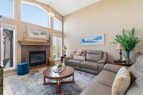 10 Goddard Circle, Carstairs, AB - Indoor Photo Showing Living Room With Fireplace