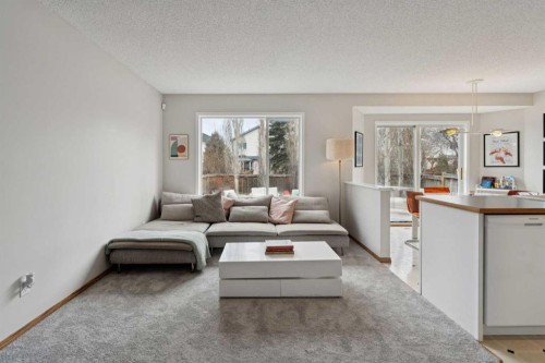 72 Mt Apex Green Se, Calgary, AB - Indoor Photo Showing Living Room