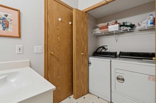 72 Mt Apex Green Se, Calgary, AB - Indoor Photo Showing Laundry Room
