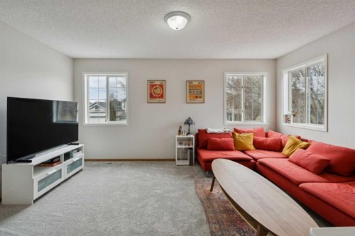 72 Mt Apex Green Se, Calgary, AB - Indoor Photo Showing Living Room