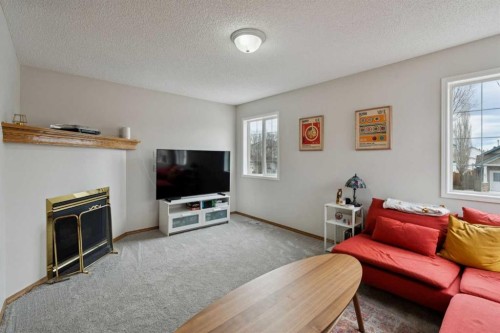 72 Mt Apex Green Se, Calgary, AB - Indoor Photo Showing Living Room