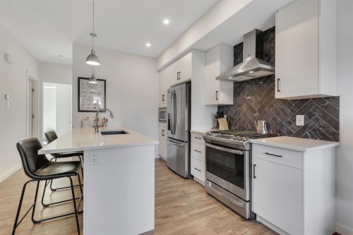 516 Greenbriar Common Nw, Calgary, AB - Indoor Photo Showing Kitchen With Stainless Steel Kitchen With Upgraded Kitchen